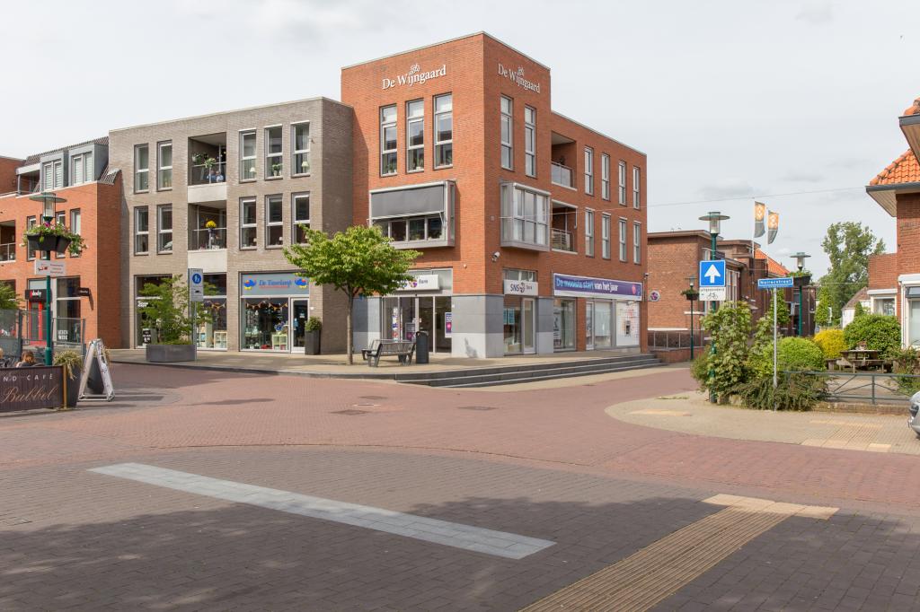 Ontwikkeling winkels en appartementen 'De Wijngaard'