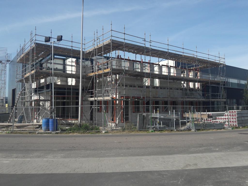 Bedrijfspand Coatinc Hop uit de steigers